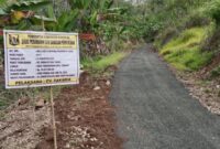 Warga Erpah girang, jalan peninggalan Belanda akhirnya diaspal setelah puluhan tahun.